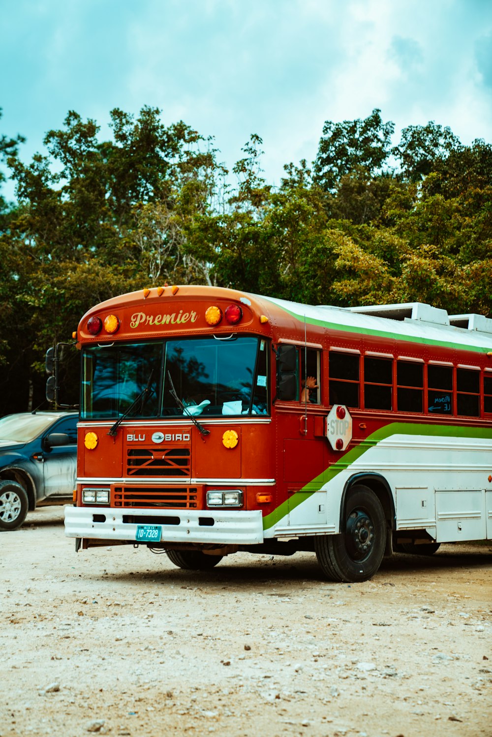 red double decker bus on road during daytime