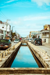 cars parked on side of the road during daytime