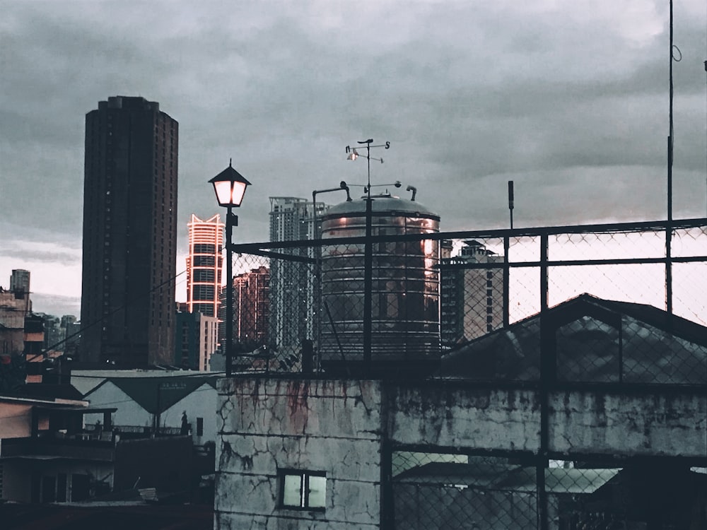 black and red building under gray sky