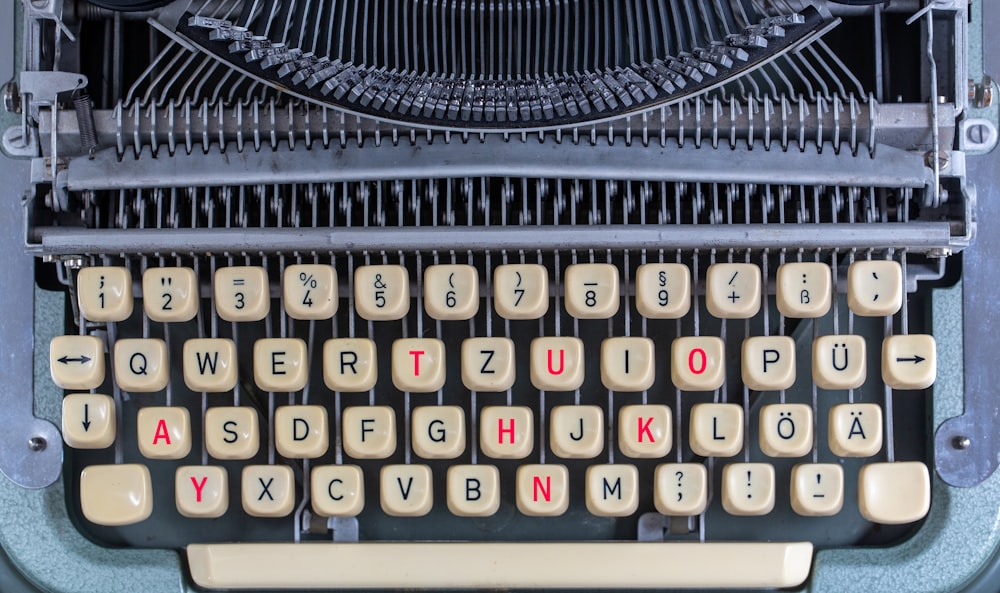 black and white typewriter on white table