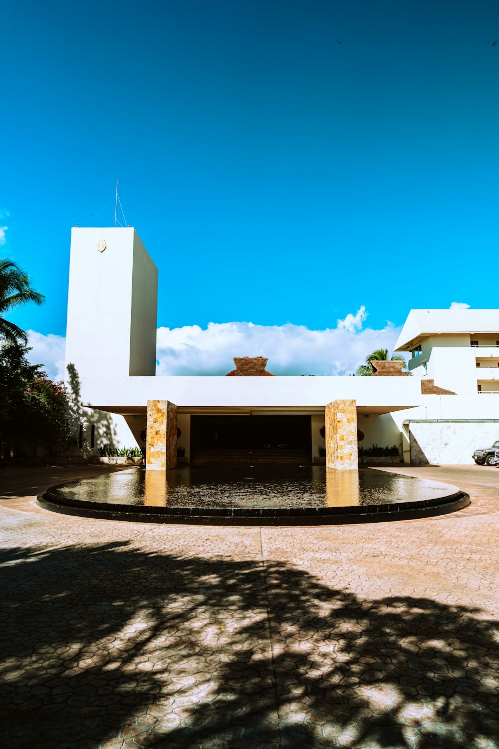 white concrete building under blue sky during daytime