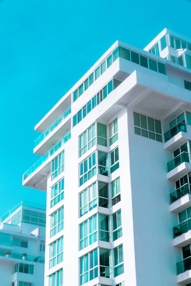 white concrete building under blue sky during daytime