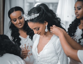 woman in white lace dress smiling