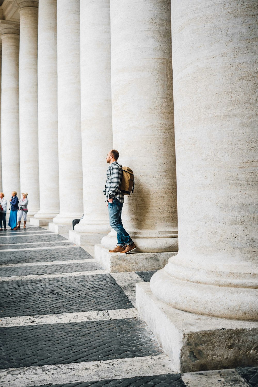 people walking on gray concrete stairs during daytime