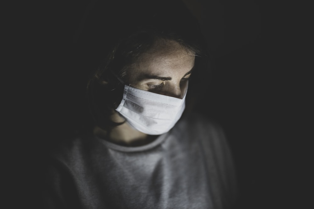 Download Person Weras White Mask To Protect From Coronavirus Photo Free Human Image On Unsplash PSD Mockup Templates
