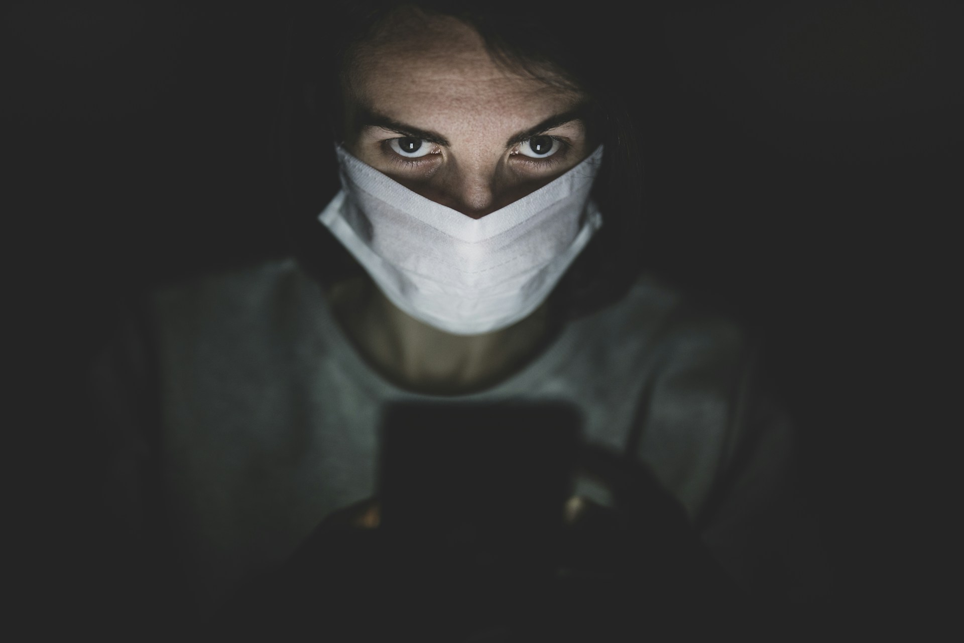 man in white face mask