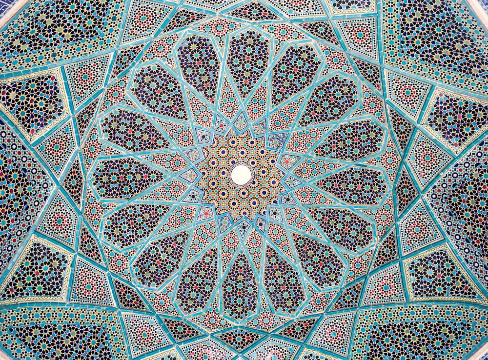 an intricately decorated ceiling in a building