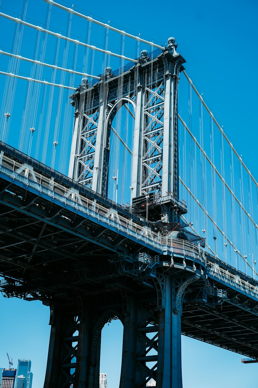 grayscale photo of bridge during daytime