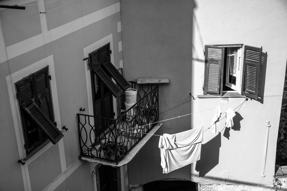 white textile on black metal railings