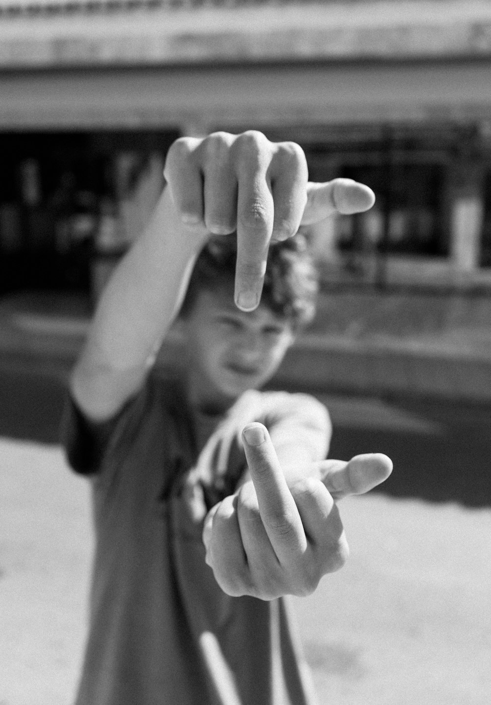 grayscale photo of persons hand