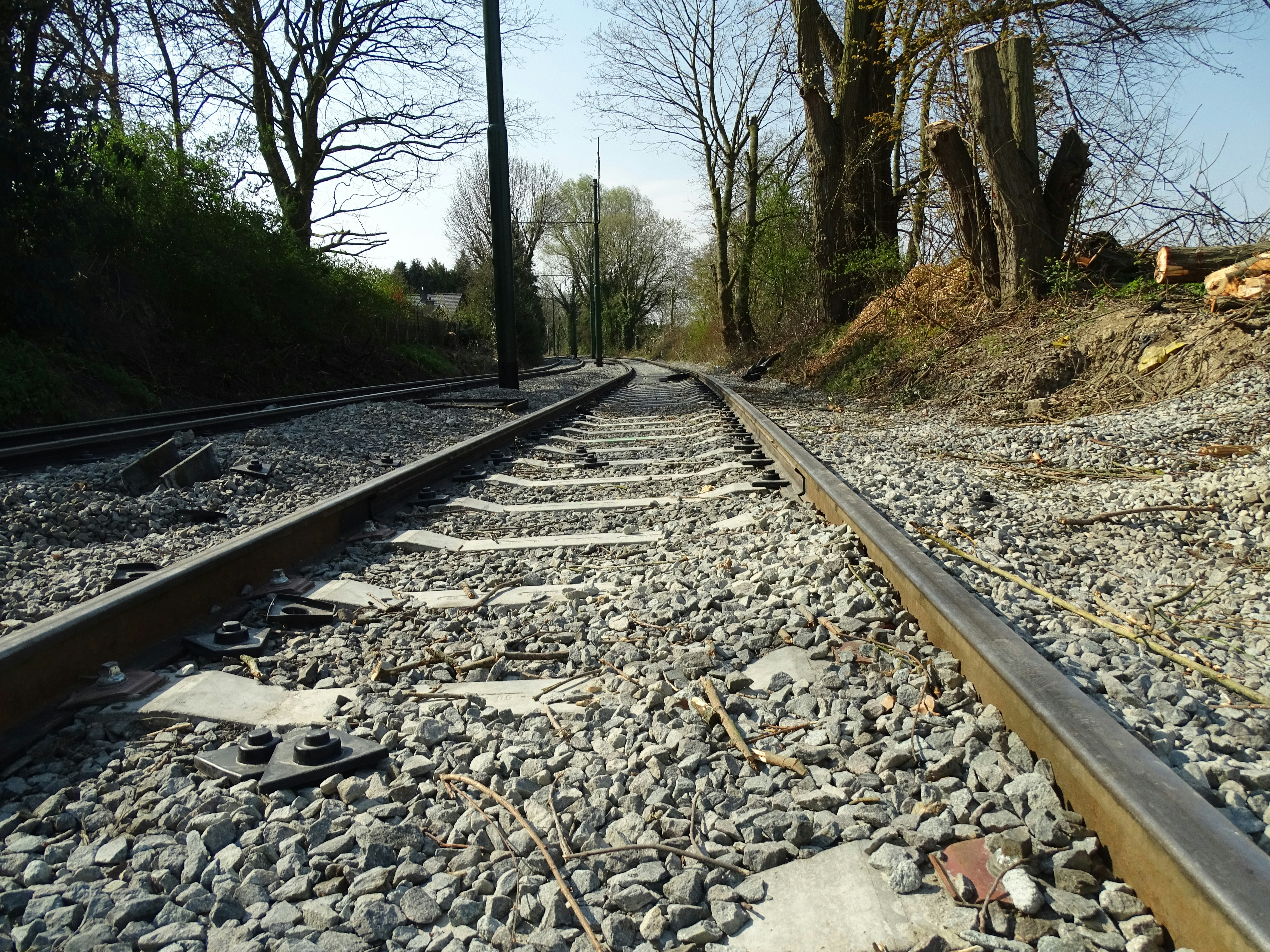 gray and white rocks on train rail