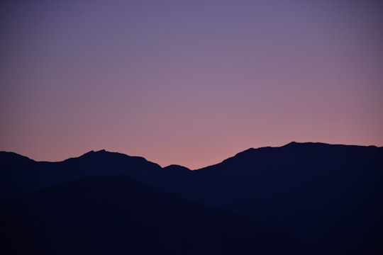 silhouette of mountain during sunset in Baghmalek Iran