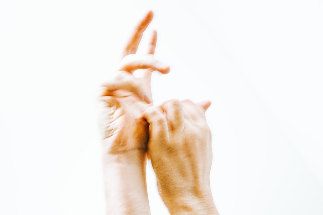 persons hand on white background