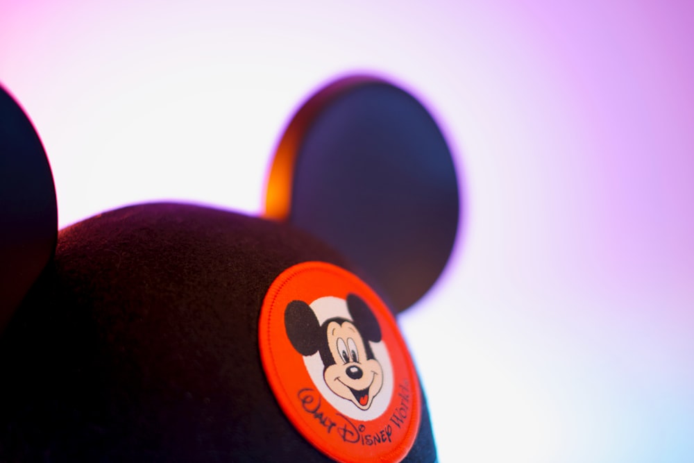 black and orange mickey mouse cap