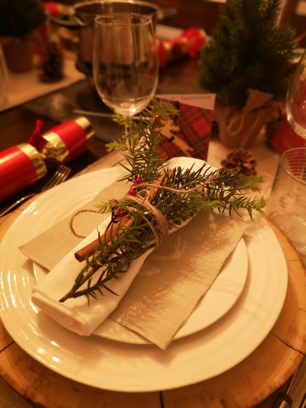 a place setting with napkins and napkins on a plate
