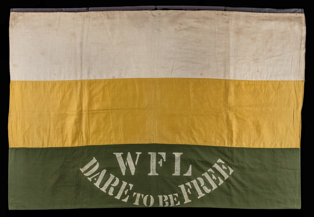 a flag with the words war to be free on it