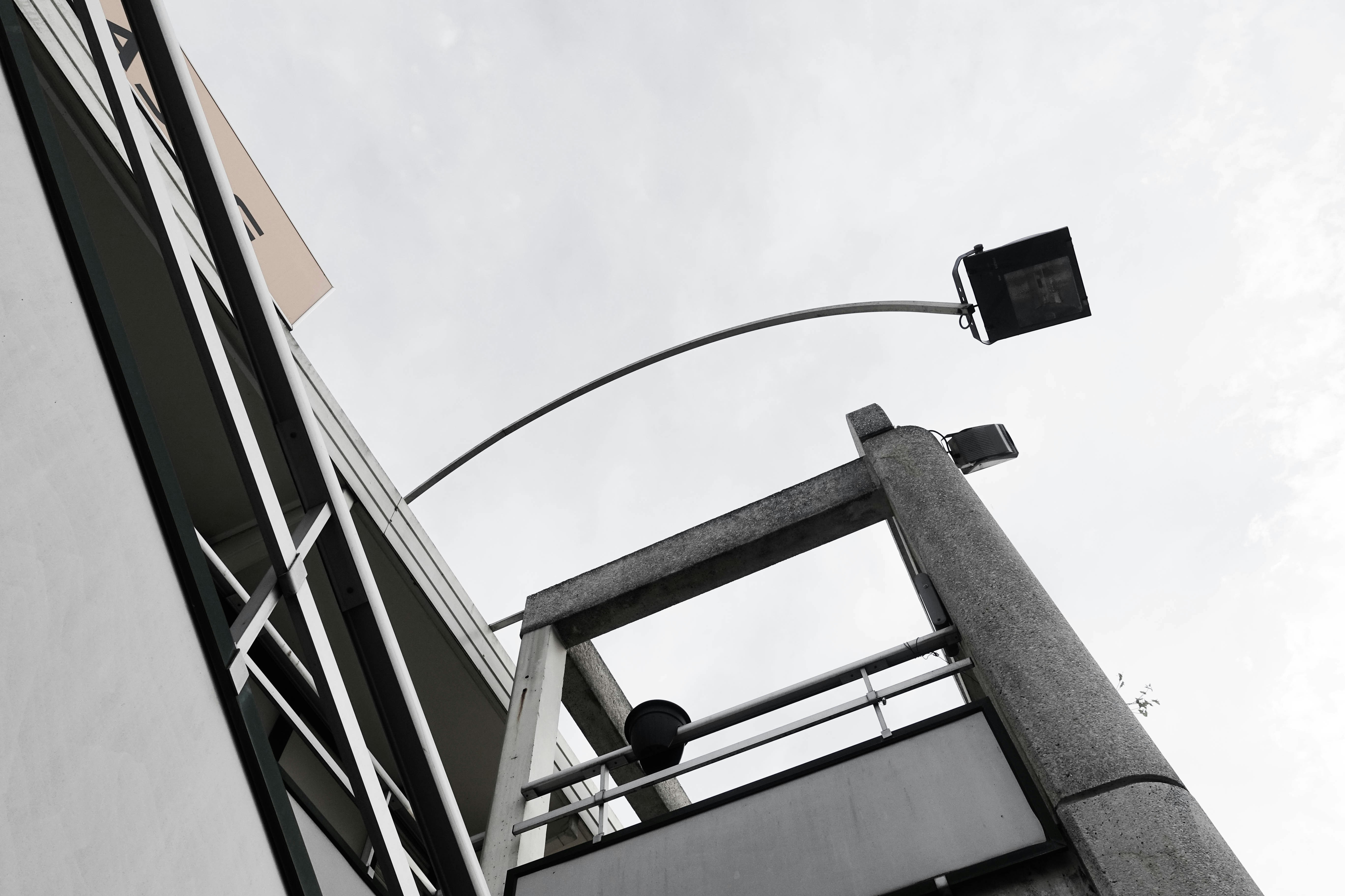 gray concrete building under white sky during daytime