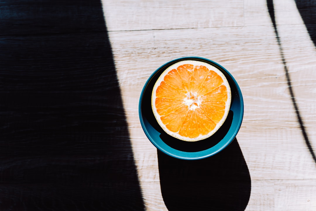 orange and white round container