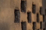 Close-up of a textured concrete wall showcasing material detail and craftsmanship.