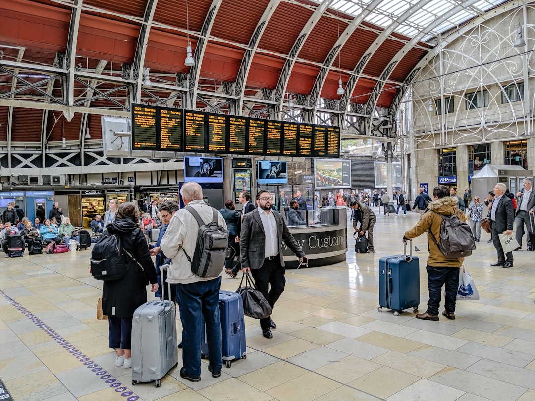people walking on train station,