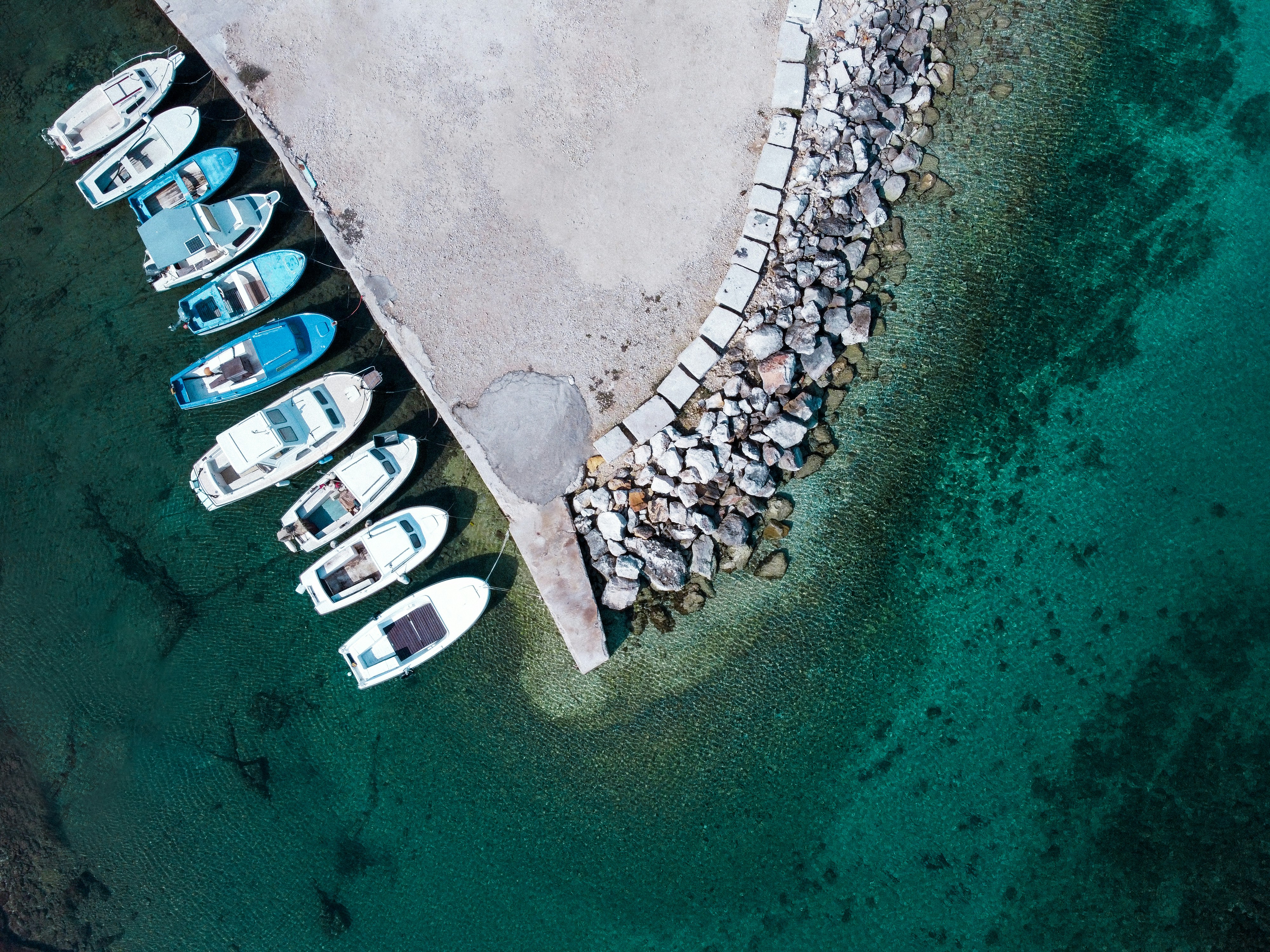 aerial view of white boat on sea during daytime