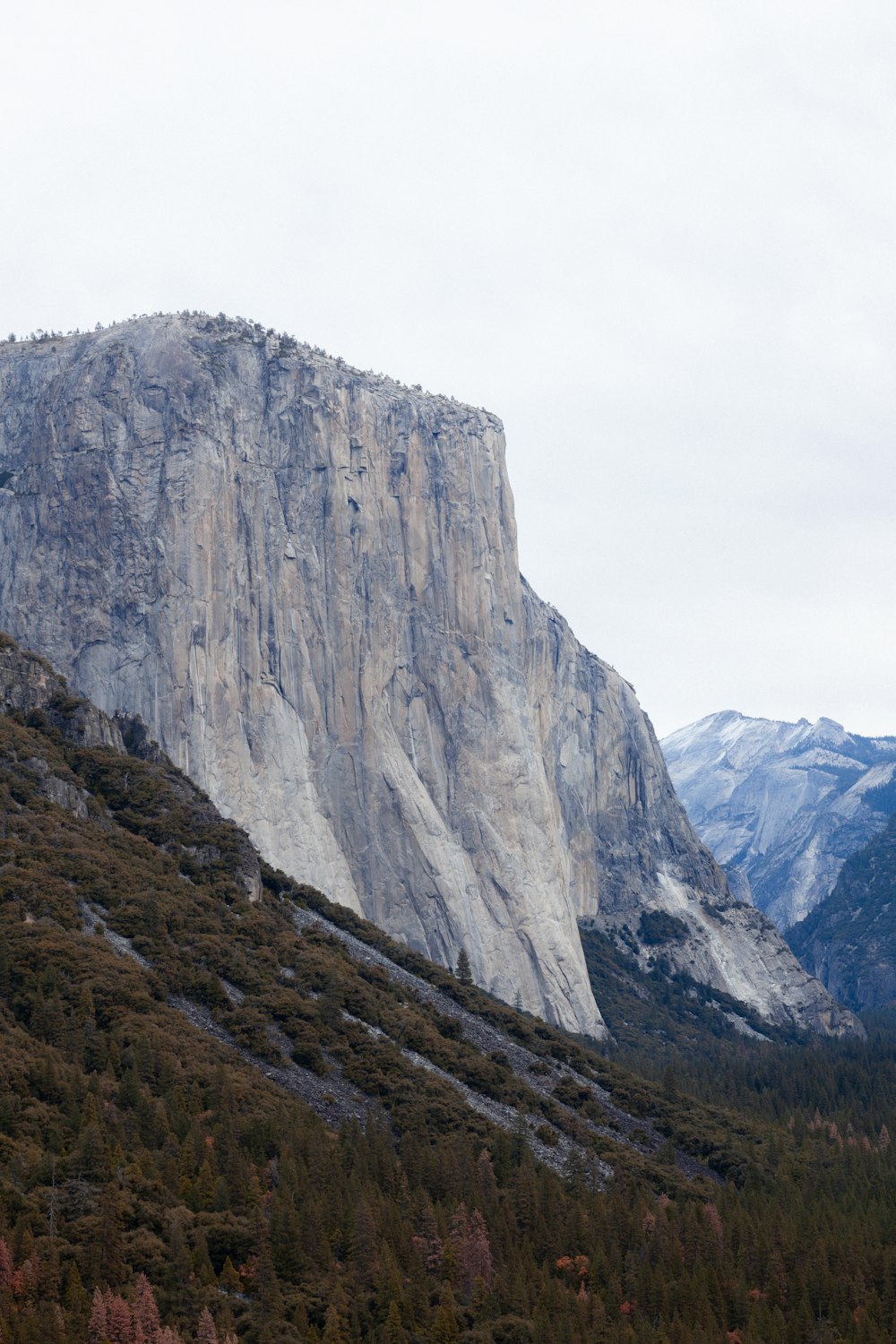 gray rocky mountain under white sky during daytime