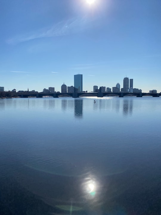 city skyline across body of water during daytime in Boston United States