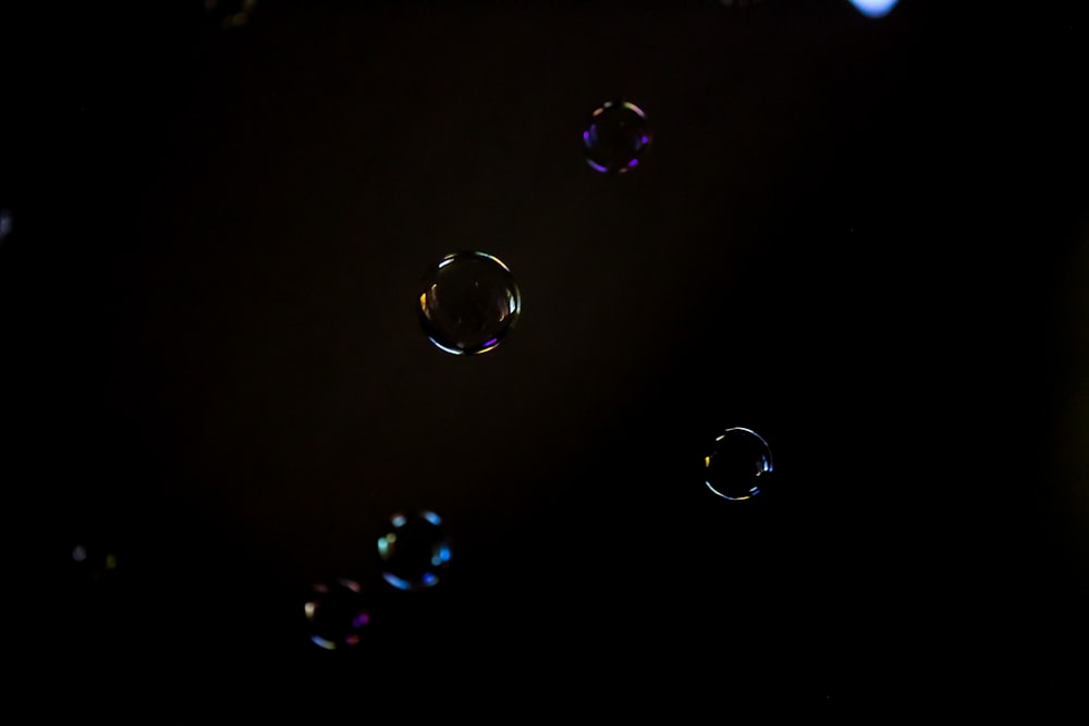 water droplets on black surface