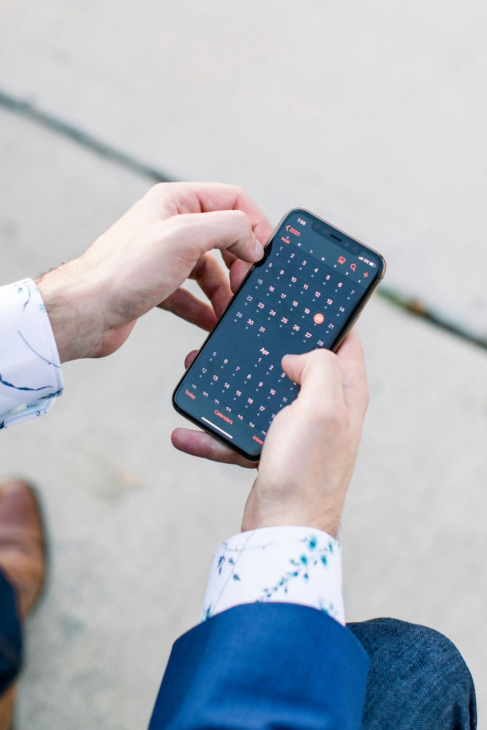 person holding black android smartphone