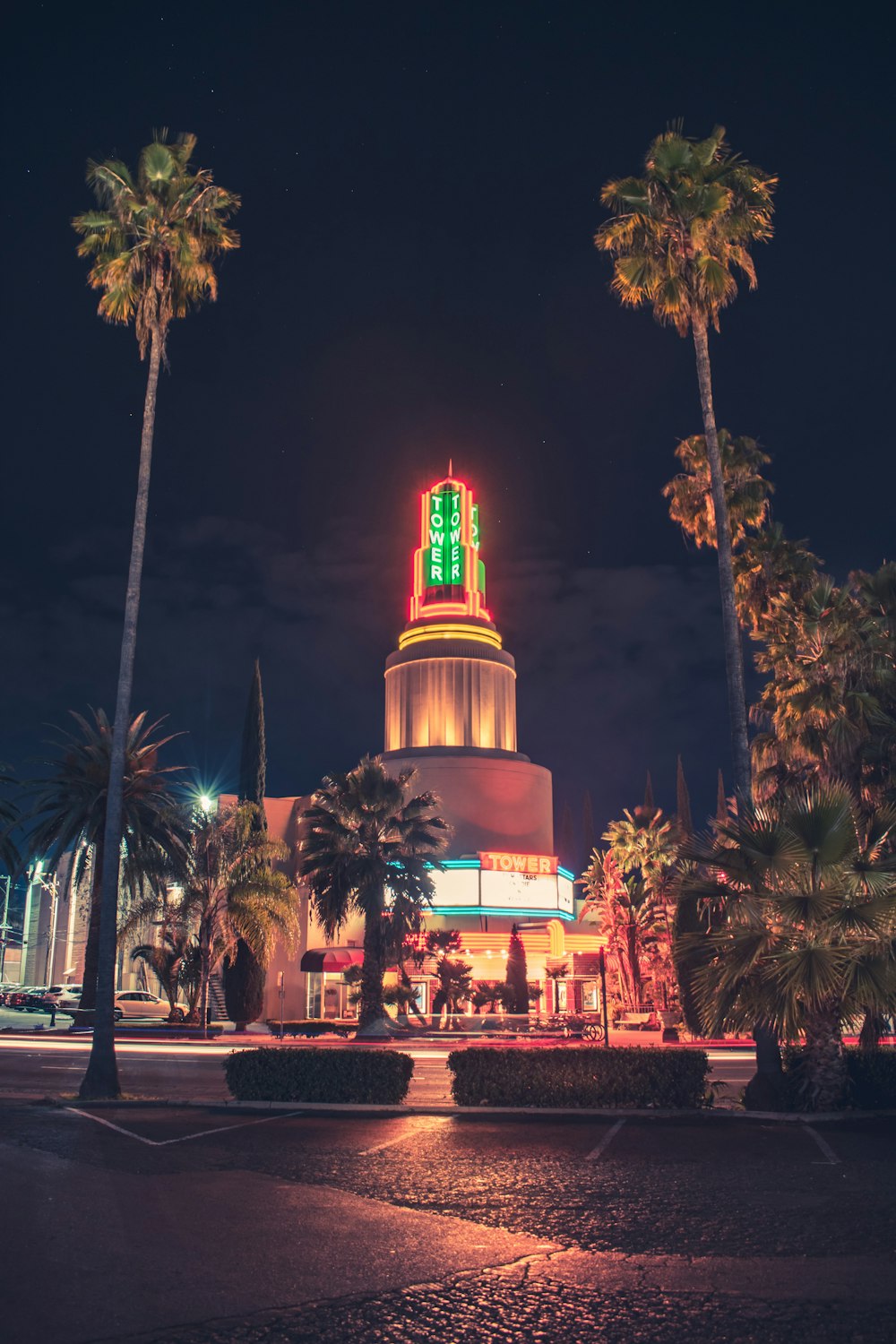 red and white concrete building during nighttime