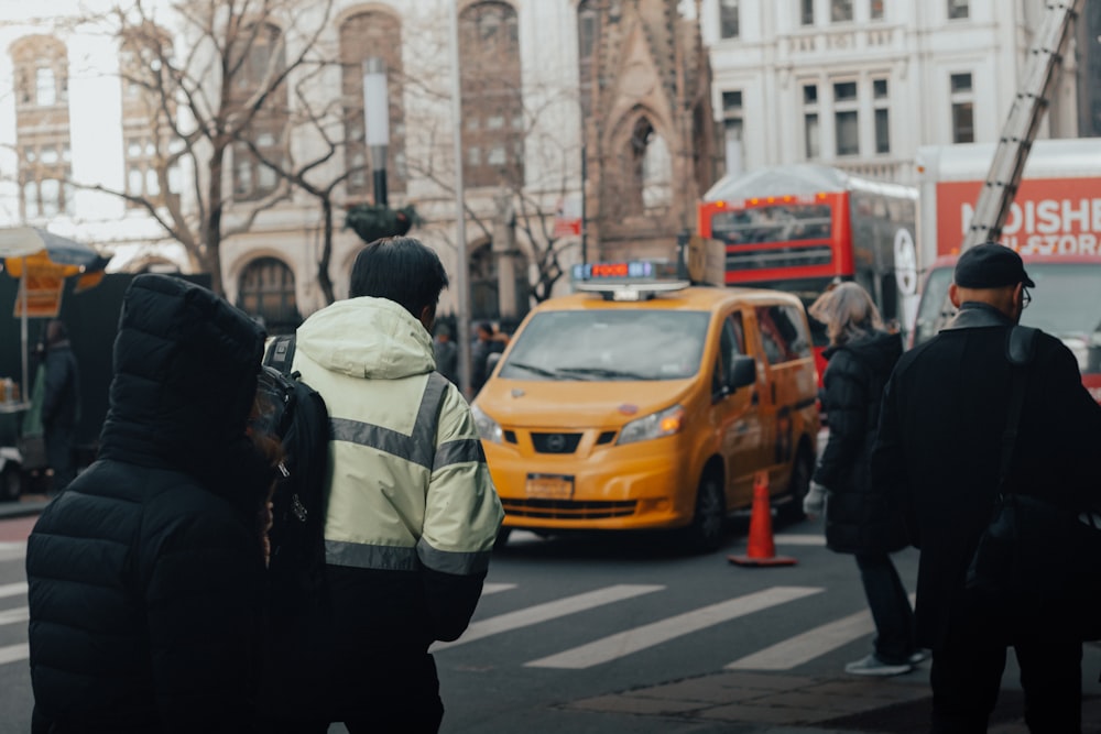 people walking on pedestrian lane during daytime