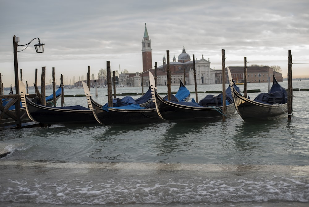 blue and brown boat on water during daytime