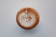 An elegant latte art design in a creamy cappuccino.