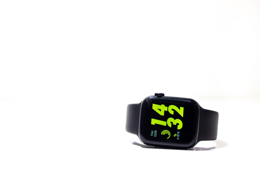 white and black digital watch