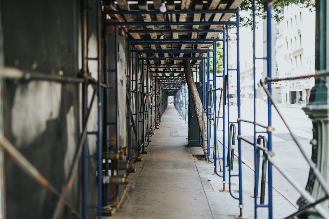 blue metal railings on hallway