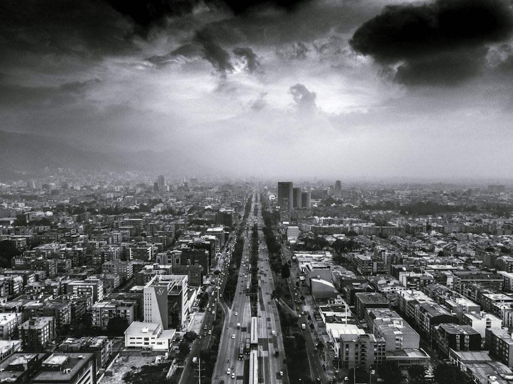 grayscale photo of city buildings