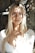 woman in white shirt smiling