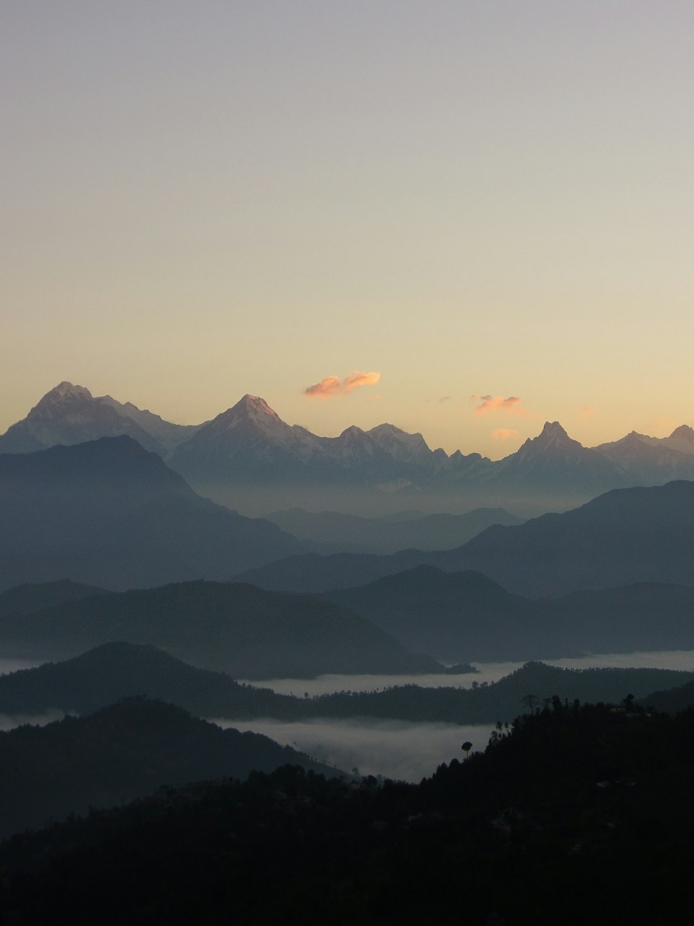 silhouette of mountains during sunset