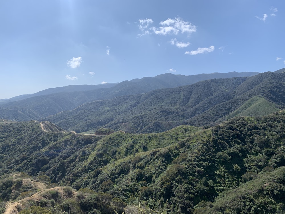 green mountains under blue sky during daytime