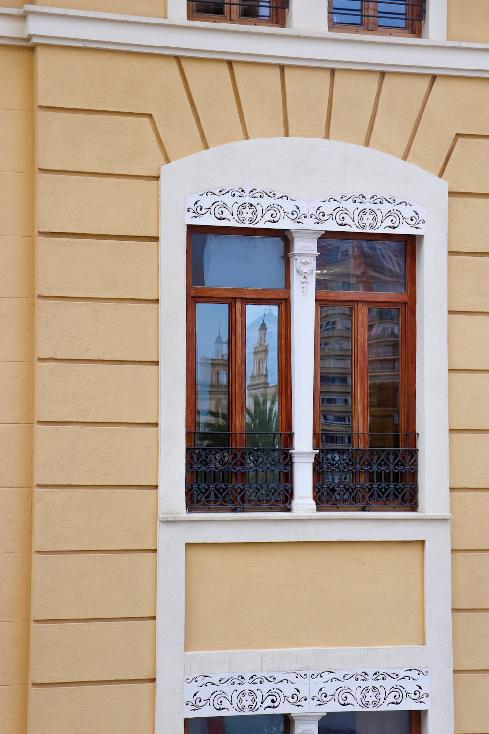 brown wooden framed glass window