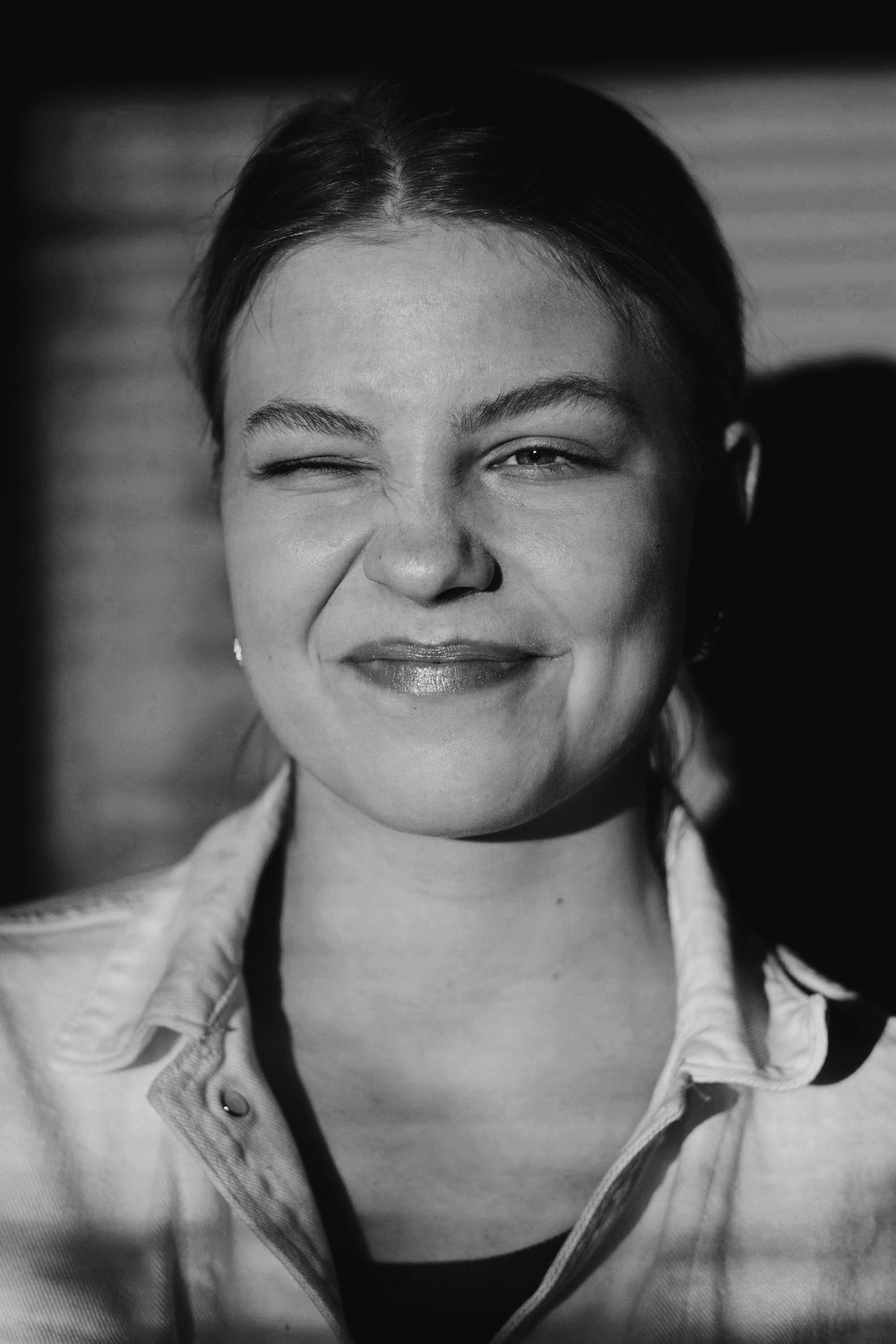 grayscale photo of smiling woman