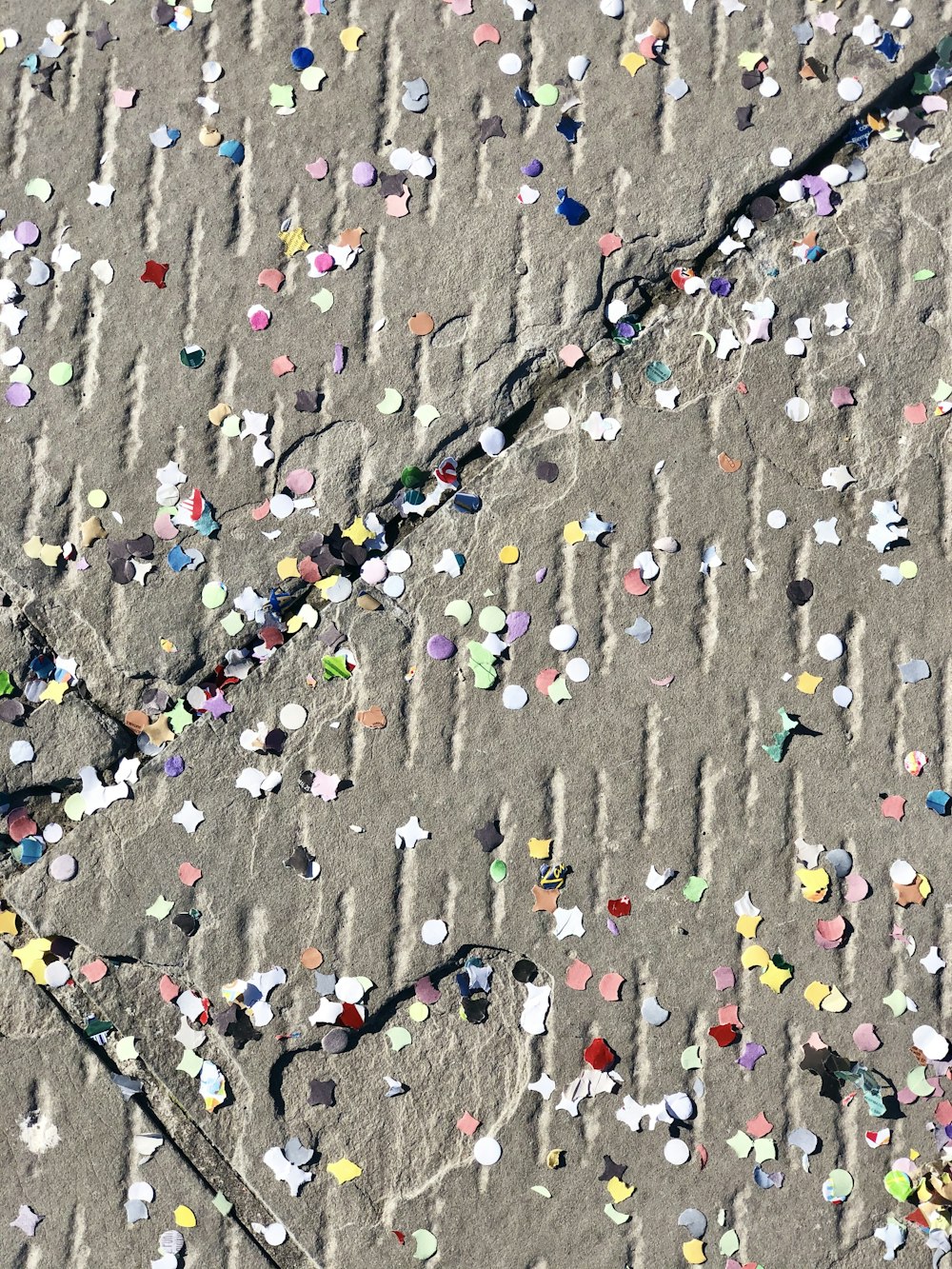 gray and blue heart shaped stones on gray concrete floor