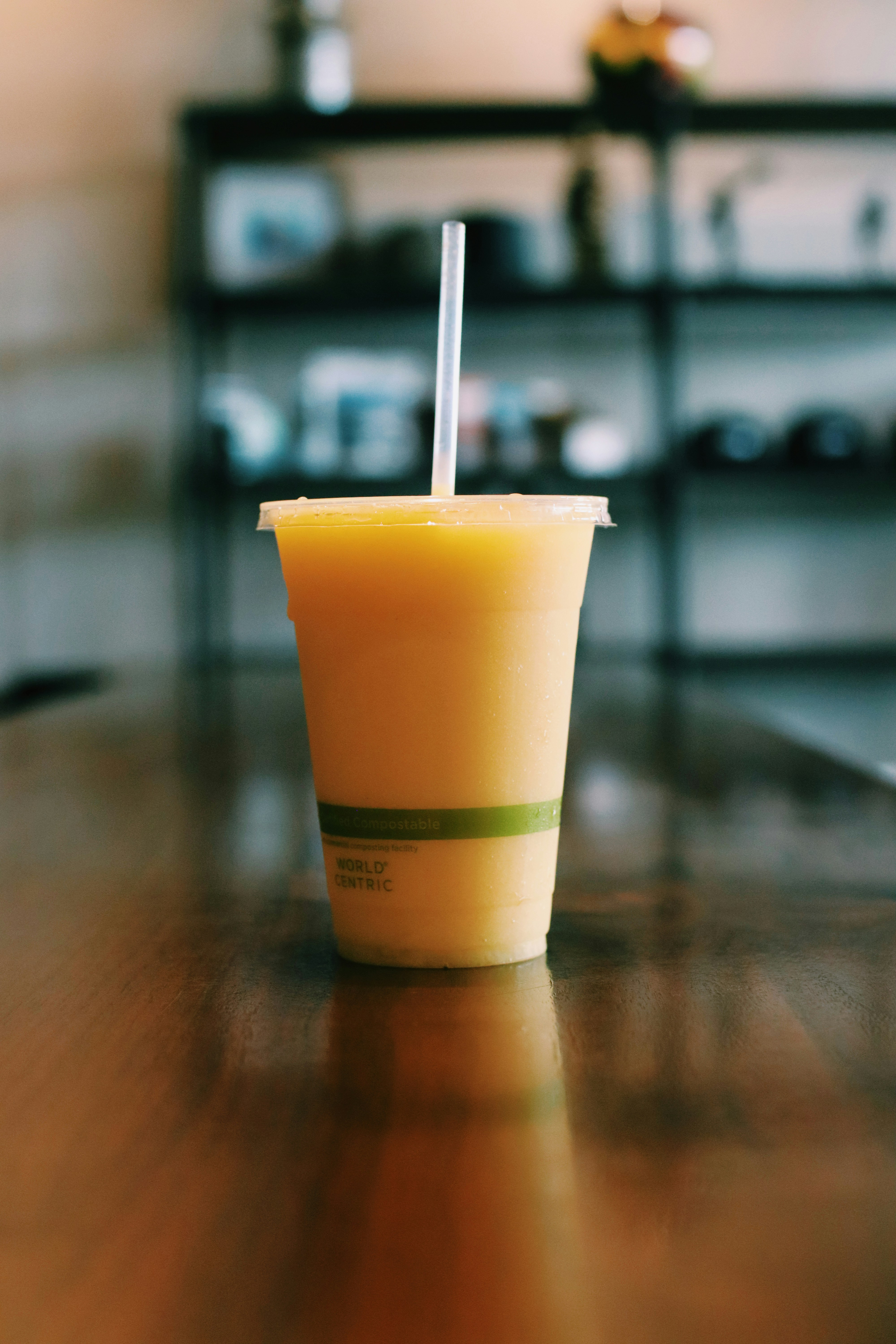 white and yellow plastic cup