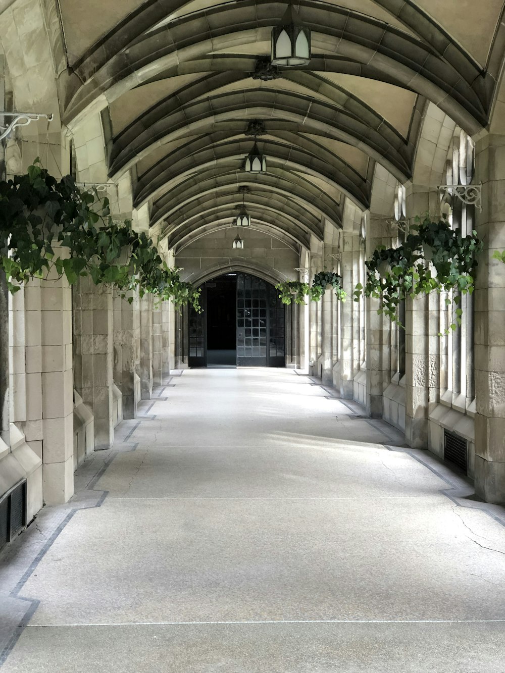 gray concrete pathway between concrete walls