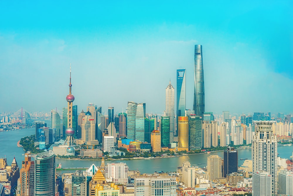 city skyline under blue sky during daytime