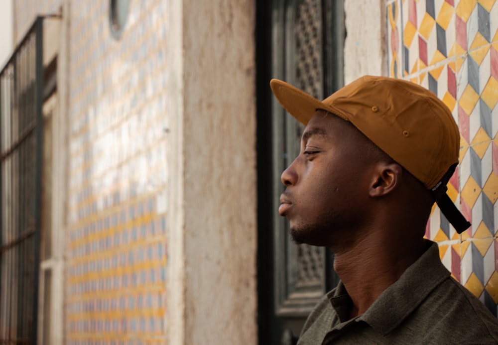 man in brown hat and gray jacket