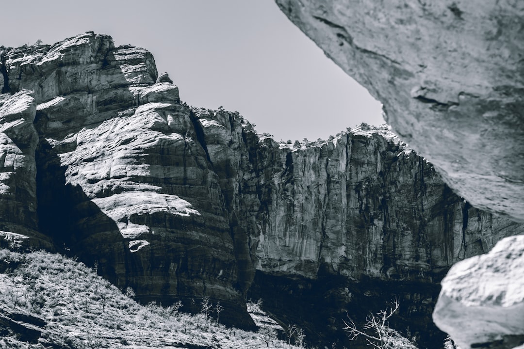 grayscale photo of rocky mountain