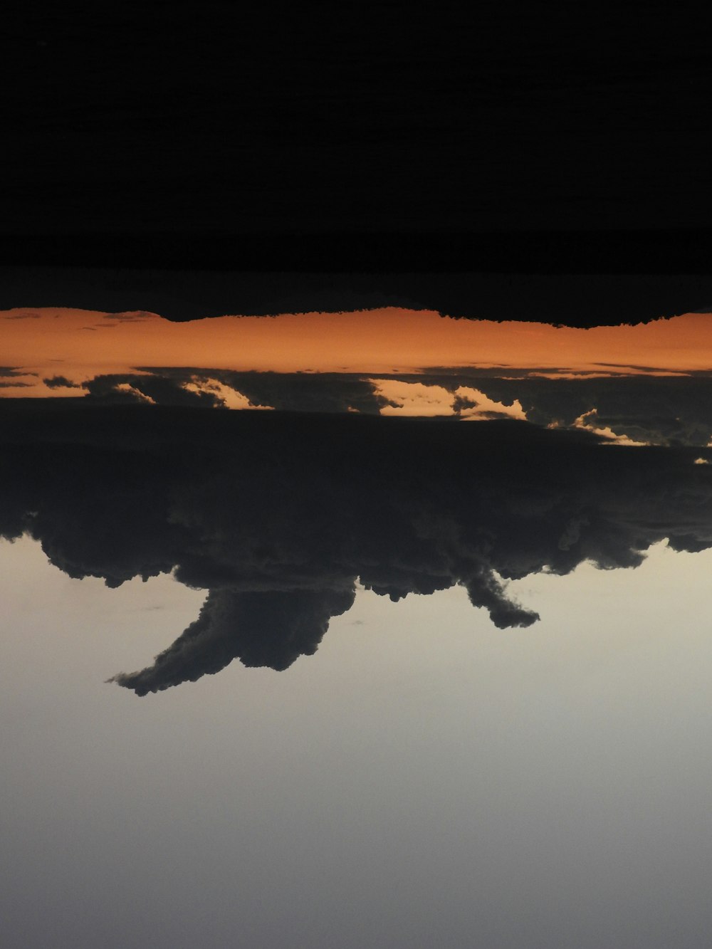 body of water during sunset