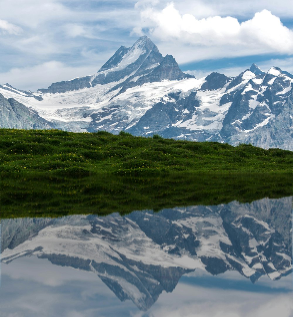 snow covered mountain during daytime