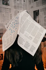 white printer paper on brown wooden table